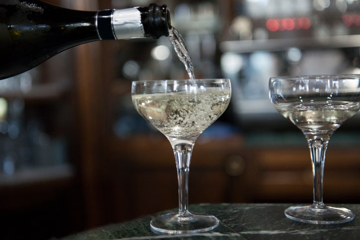 A moment of Prosecco, which is the sparkling wine being poured into a coupe glass